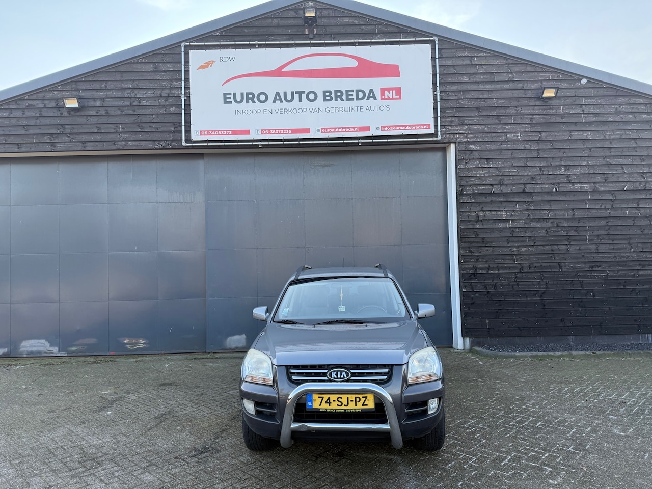 Kia Sportage - 2.0 CVVT Comfort 2.0 CVVT Comfort - AutoWereld.nl