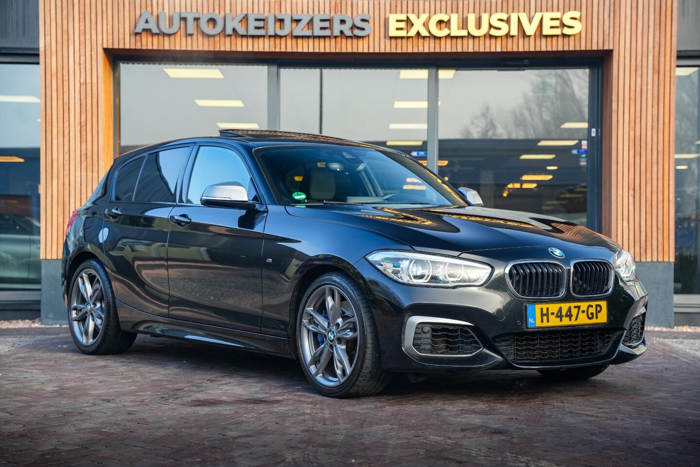 BMW 1-serie - M140i xDrive Centennial High Executive Panodak Harman Kardon Memory Keyless Cruise Navigat - AutoWereld.nl