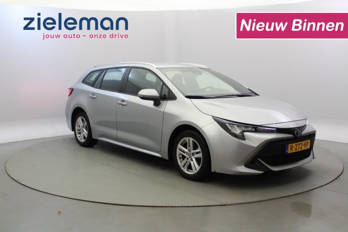 Toyota Corolla - Touring 1.8 Hybrid Active - Carplay Camera, Clima - AutoWereld.nl