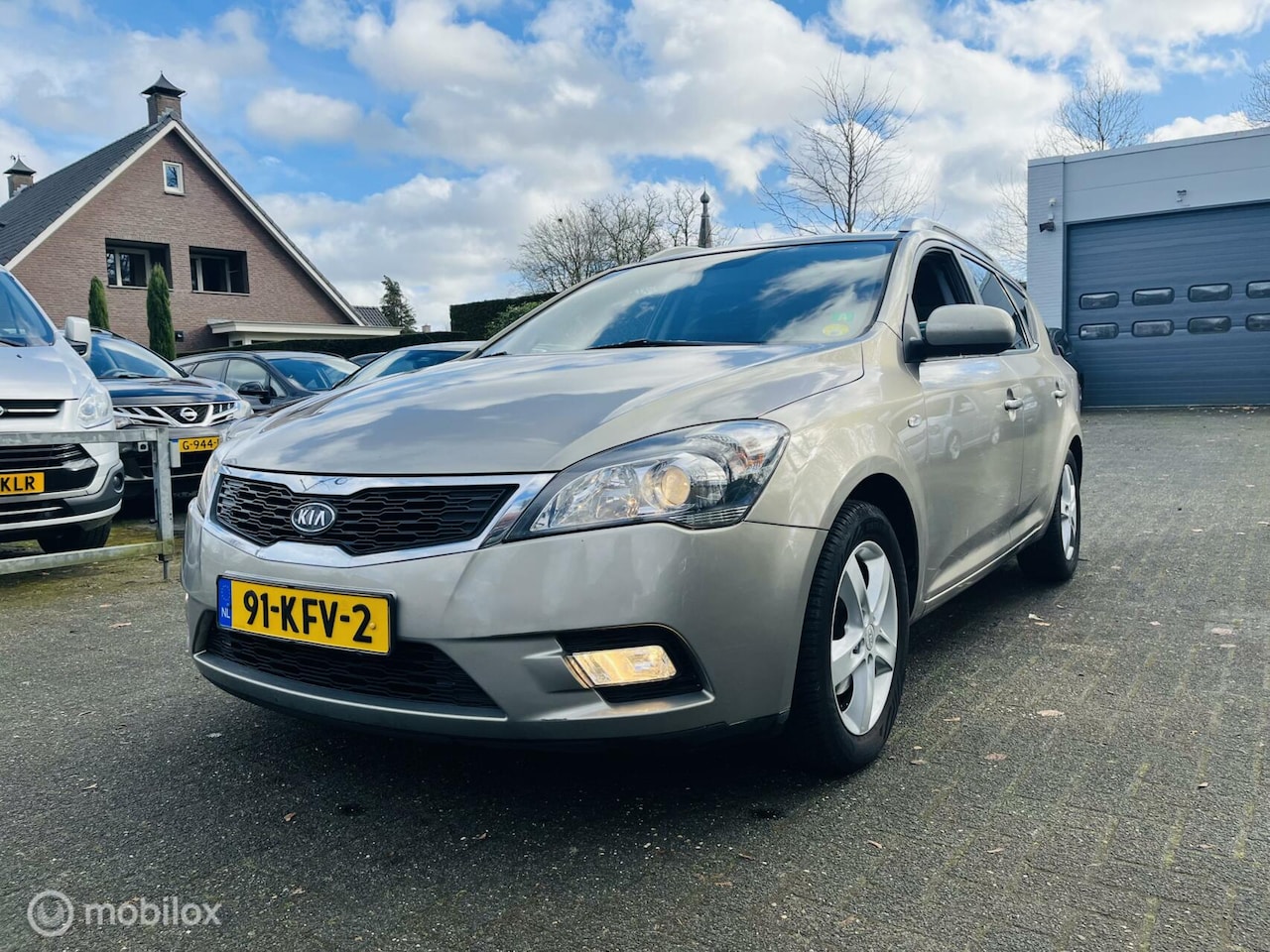 Kia Cee'd Sporty Wagon - 1.4 CVVT X-ecutive Climate / Audio / LM / Trekhaak - AutoWereld.nl