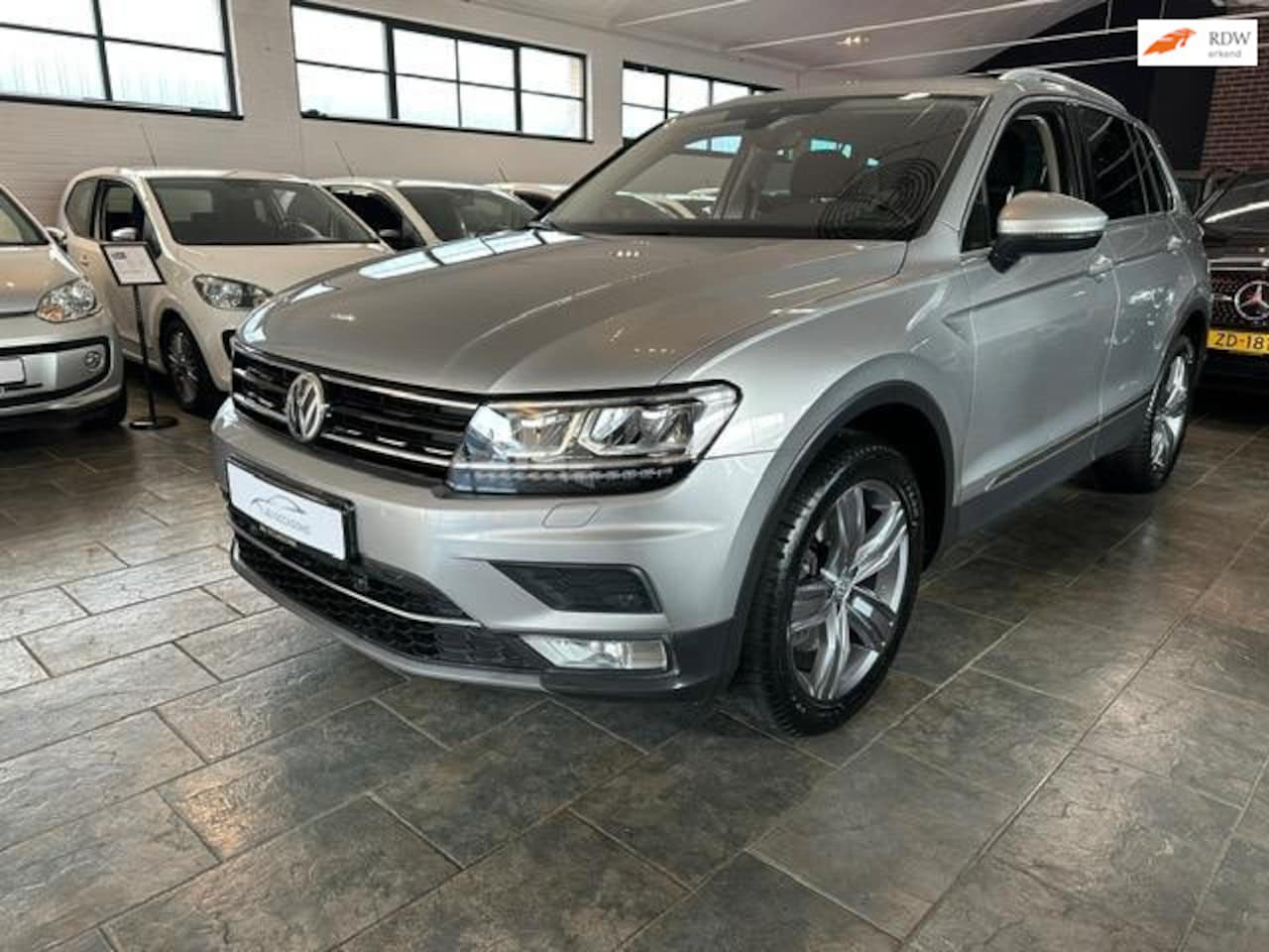 Volkswagen Tiguan - 1.4 TSI ACT Highline | Dynaudio | Navi | Virtual | - AutoWereld.nl