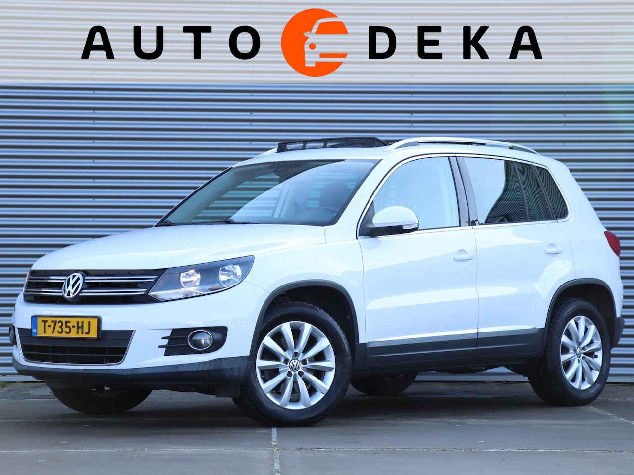 Volkswagen Tiguan - 1.4 TSI Sport&Style *Panodak*Navigatie*Parkeersens.* - AutoWereld.nl