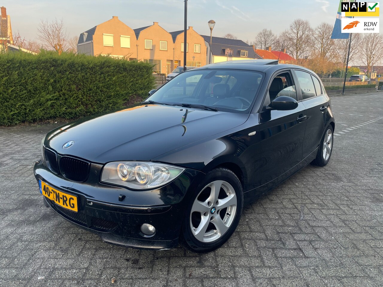 BMW 1-serie - 120d High Executive LEER/DAKJE/CLIMA/XENON/CRUISE - AutoWereld.nl