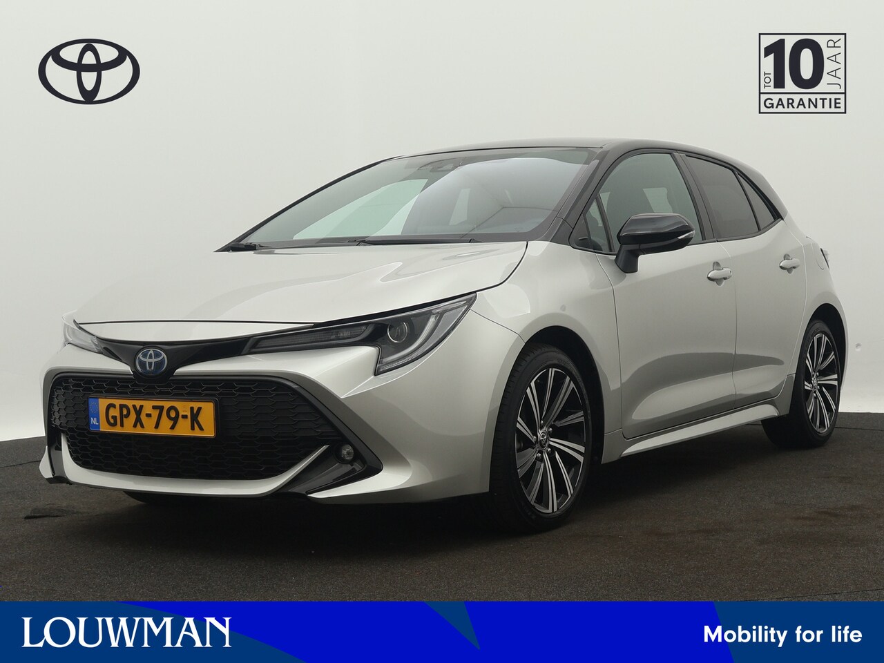 Toyota Corolla - 1.8 Hybrid Dynamic Bi-tone Limited | Camera | Climate Control | Stoelverwarming | LM velge - AutoWereld.nl