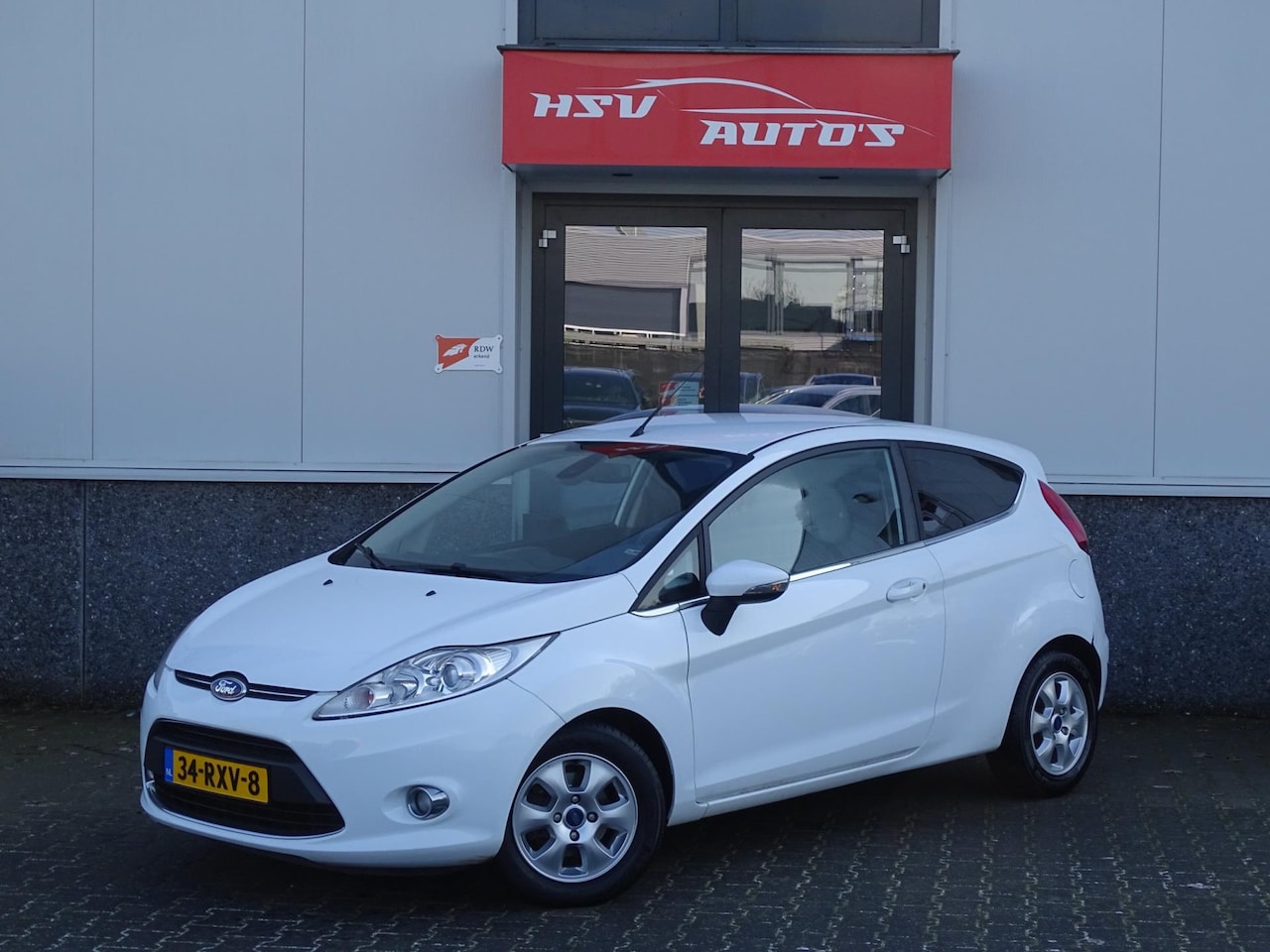 Ford Fiesta - 1.6 TDCi ECOnetic Titanium airco LM org NL - AutoWereld.nl