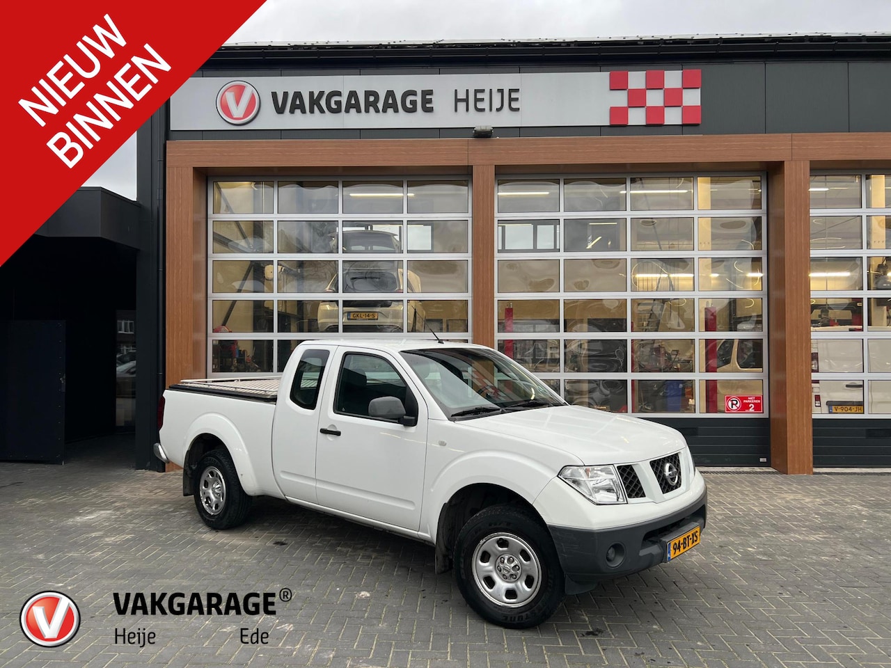 Nissan Navara - 2.5 dCi XE King Cab Comfort | Airco | - AutoWereld.nl