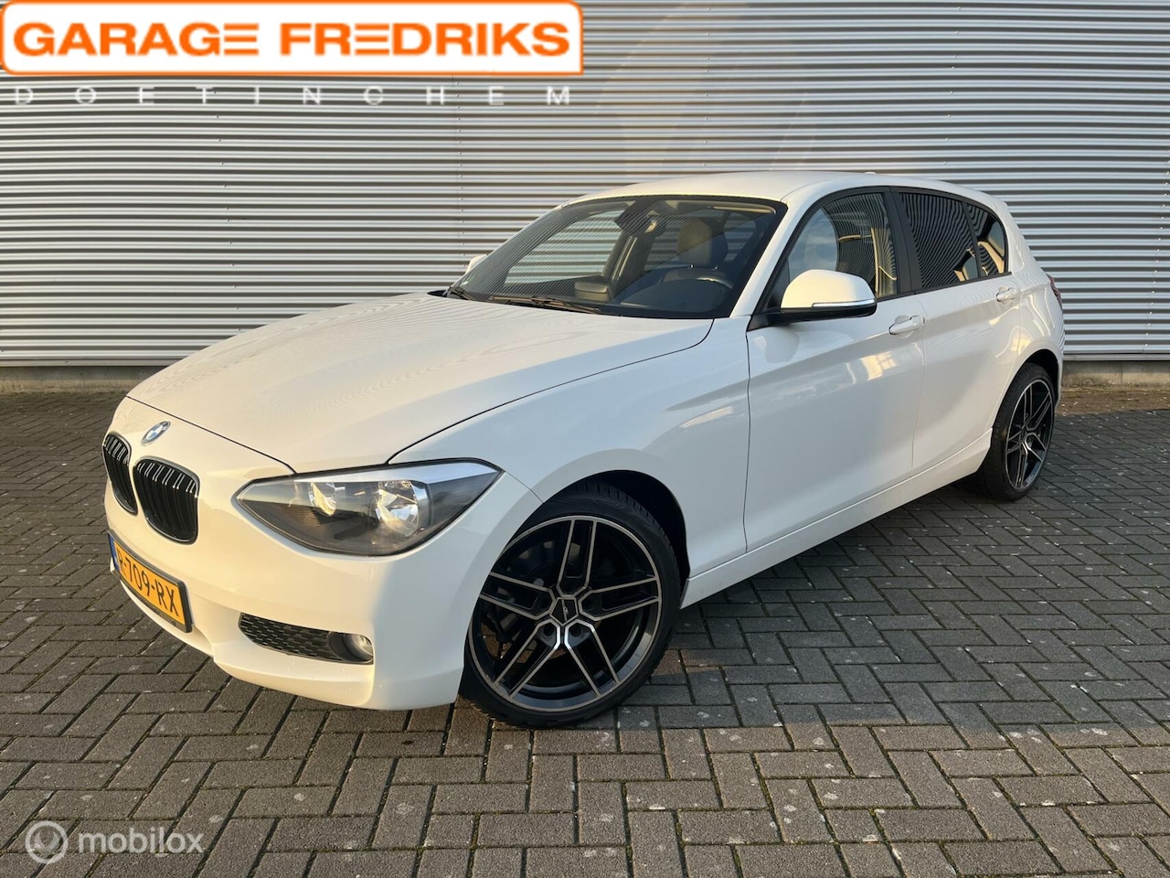 BMW 1-serie - 118i Business+ | Airco | Cruise | Parkeersensoren | - AutoWereld.nl