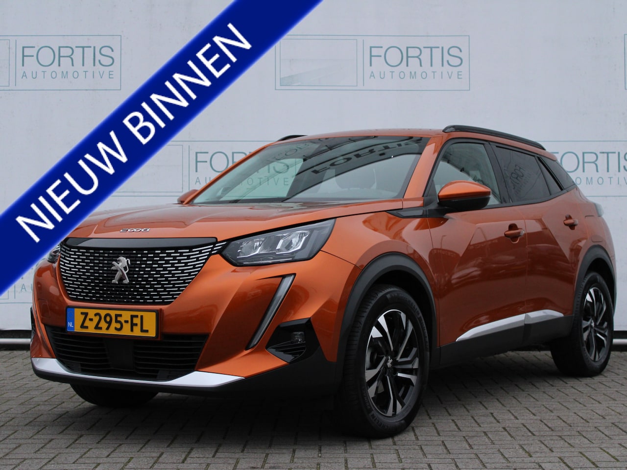 Peugeot 2008 - 1.2 PureTech Allure Pack CAMERA | CARPLAY | HALF LEDER | CRUISE | - AutoWereld.nl