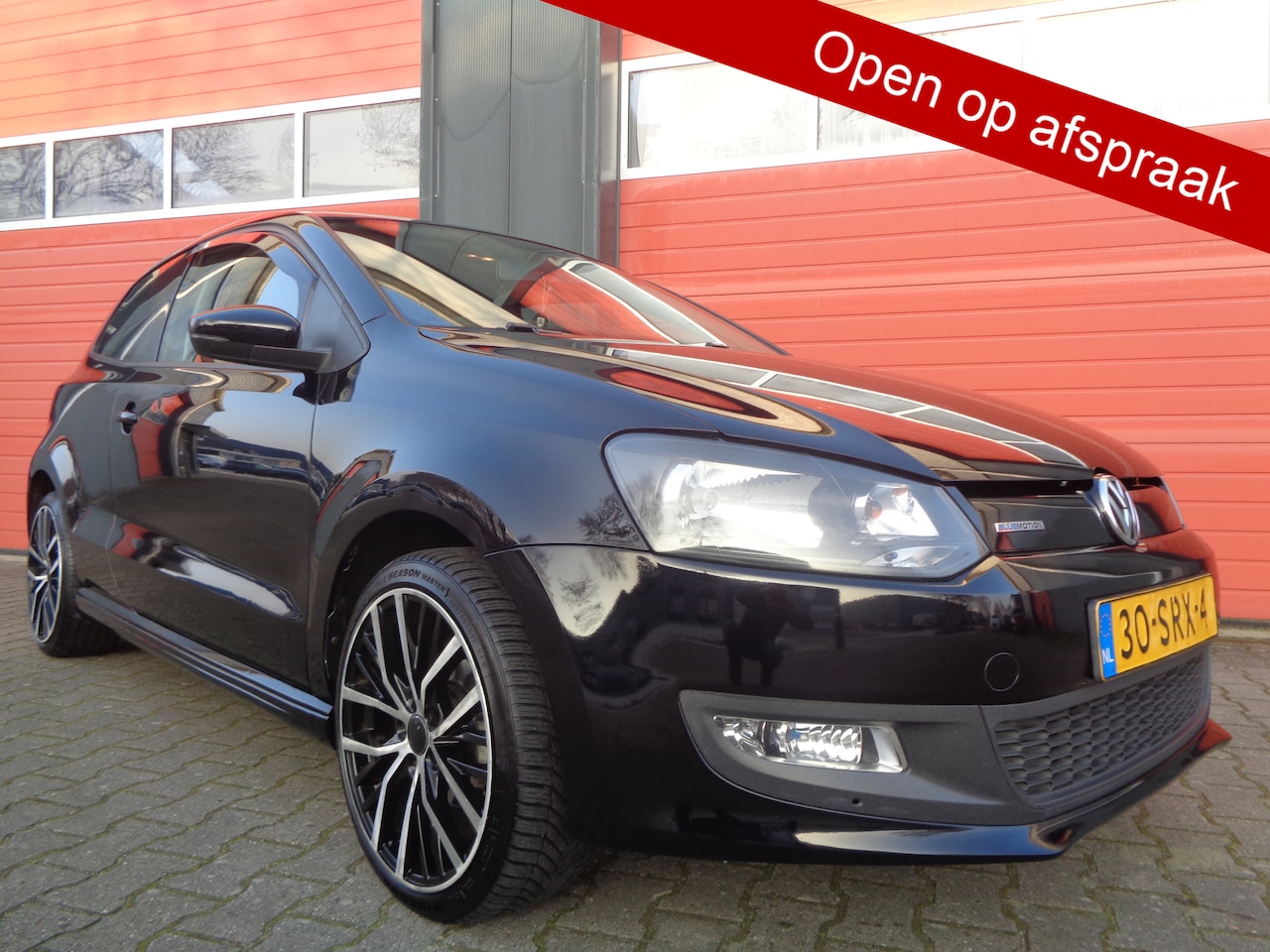 Volkswagen Polo - 1.2 TDI BlueMotion Comfortline Navi Airco Cruise LMV NL-Auto - AutoWereld.nl