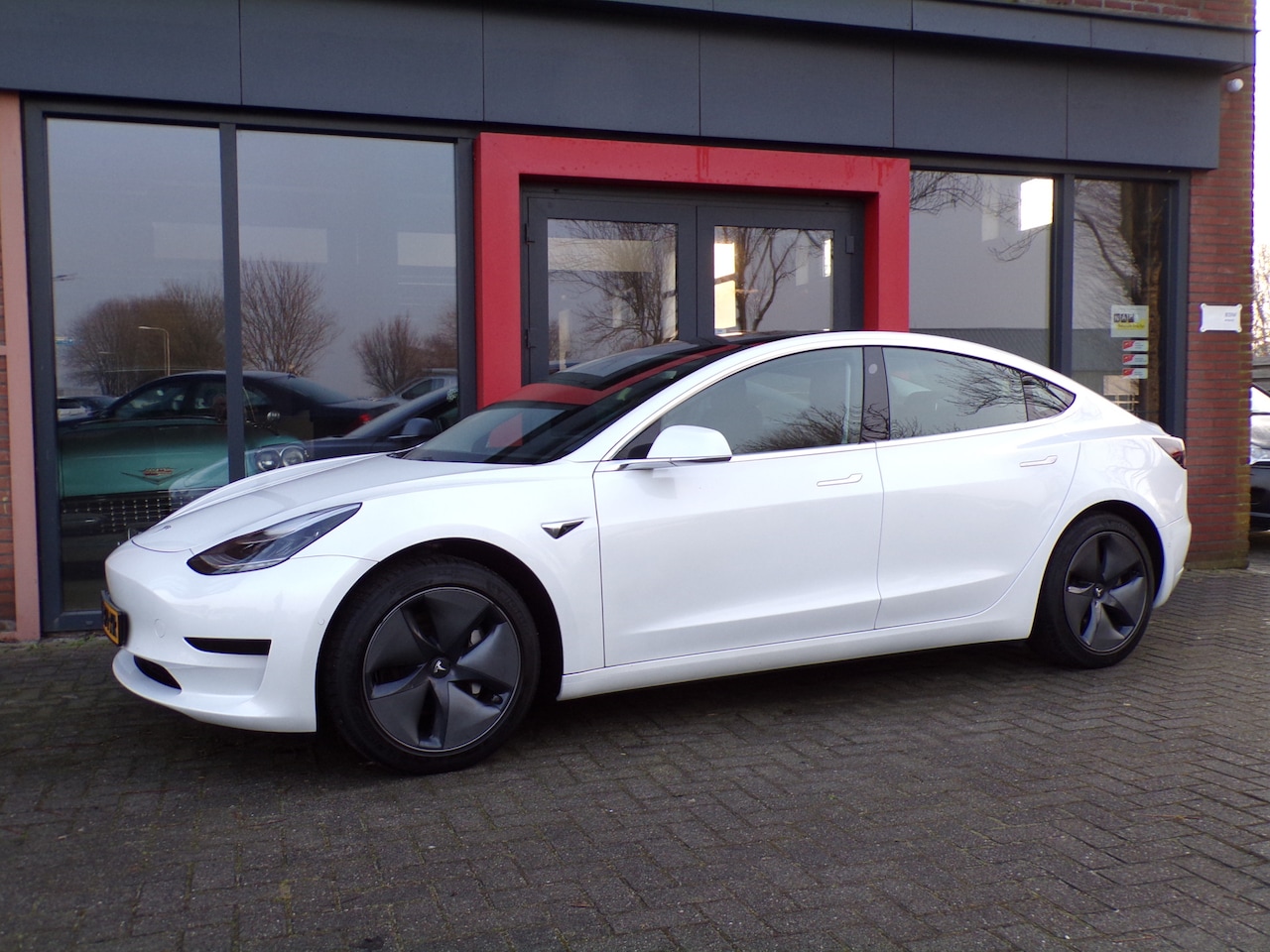 Tesla Model 3 - Standard RWD Plus 60 kWh Trekhaak Full self driving Panoramadak Parelmoer - AutoWereld.nl