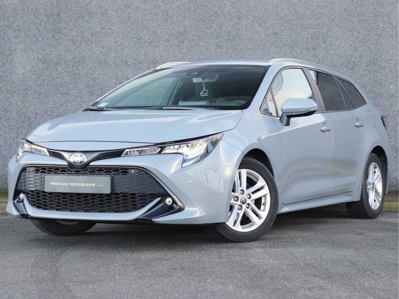 Toyota Corolla Touring Sports - 1.8 Hybrid Active |CAMERA|NAVI|STOELV|CEMENT GRAY METALLIC - AutoWereld.nl