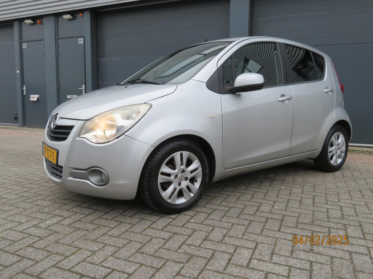 Opel Agila - 1.0 Edition kleine 5 deurs airco 2012 92819 km nap - AutoWereld.nl