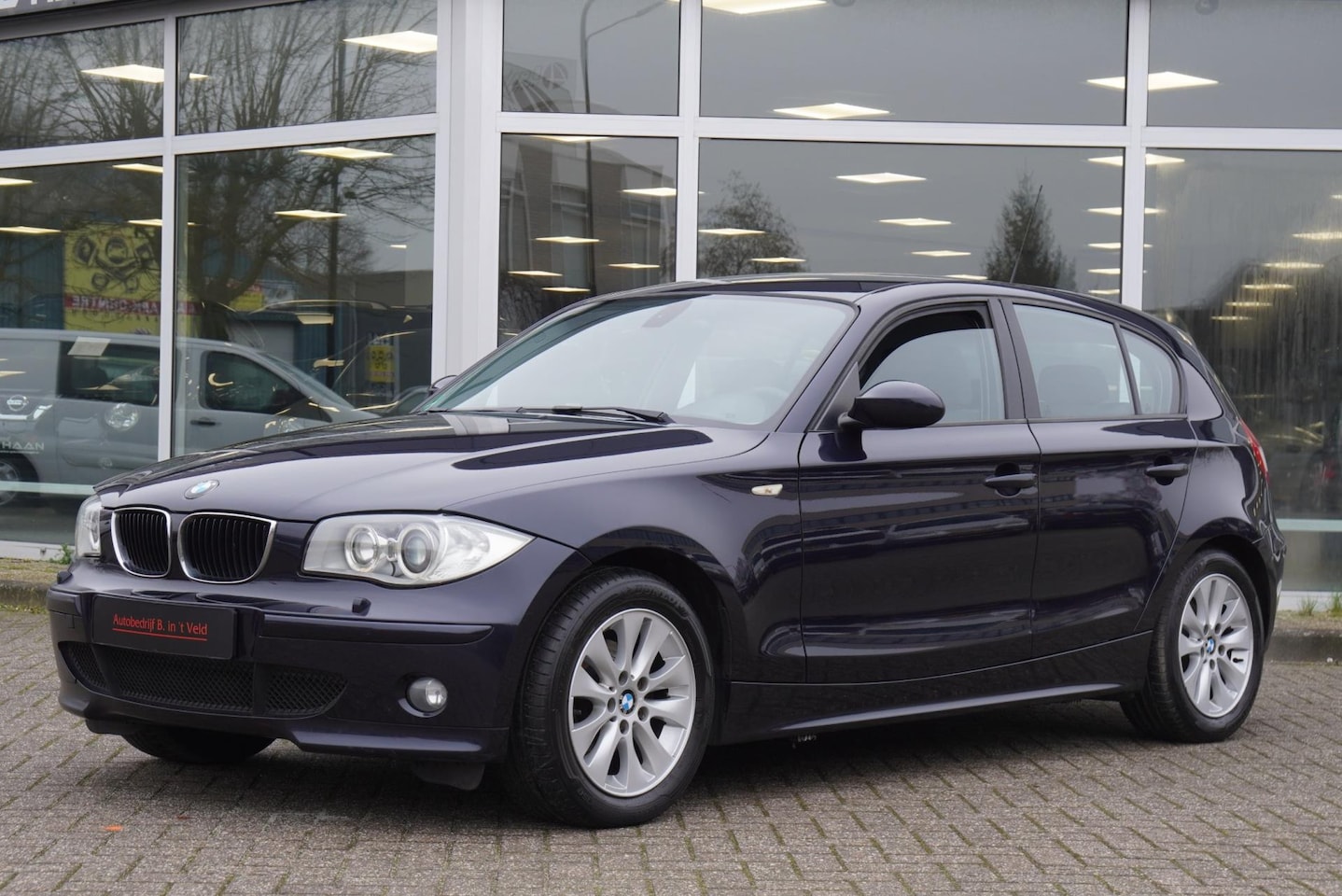 BMW 1-serie - 118i Executive XENON PDC CLIMA CRUISE MULTIF. STUUR LM VELGEN - AutoWereld.nl