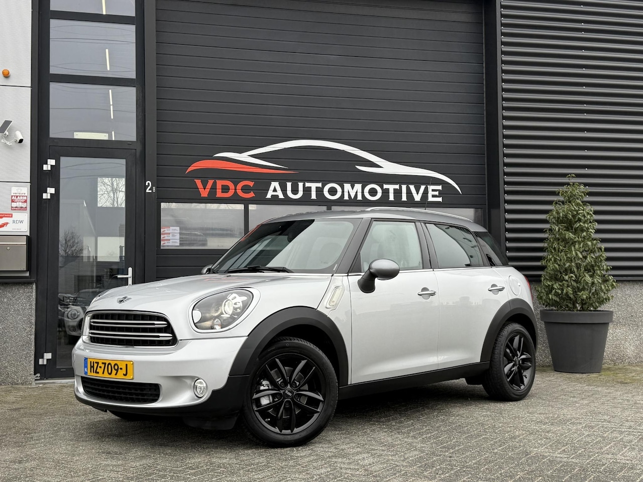 MINI Countryman - Mini 1.6 Cooper Chili Navi | Xenon | Parkeersensoren | Stoelverwarming | Weinig KM! - AutoWereld.nl