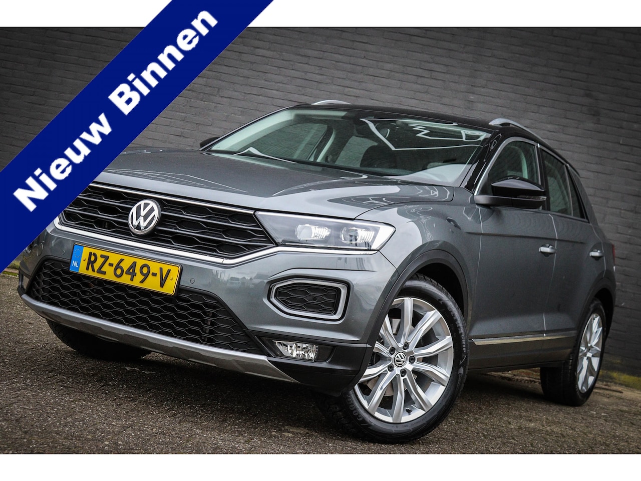 Volkswagen T-Roc - 1.5 TSI Sport /Panorama/Leer/Camera/Navi - AutoWereld.nl