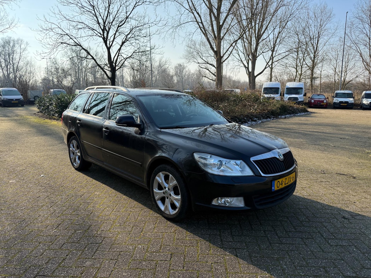 Skoda Octavia Combi - 1.2 TSI Elegance Business Line Cruise Airco PDC - AutoWereld.nl