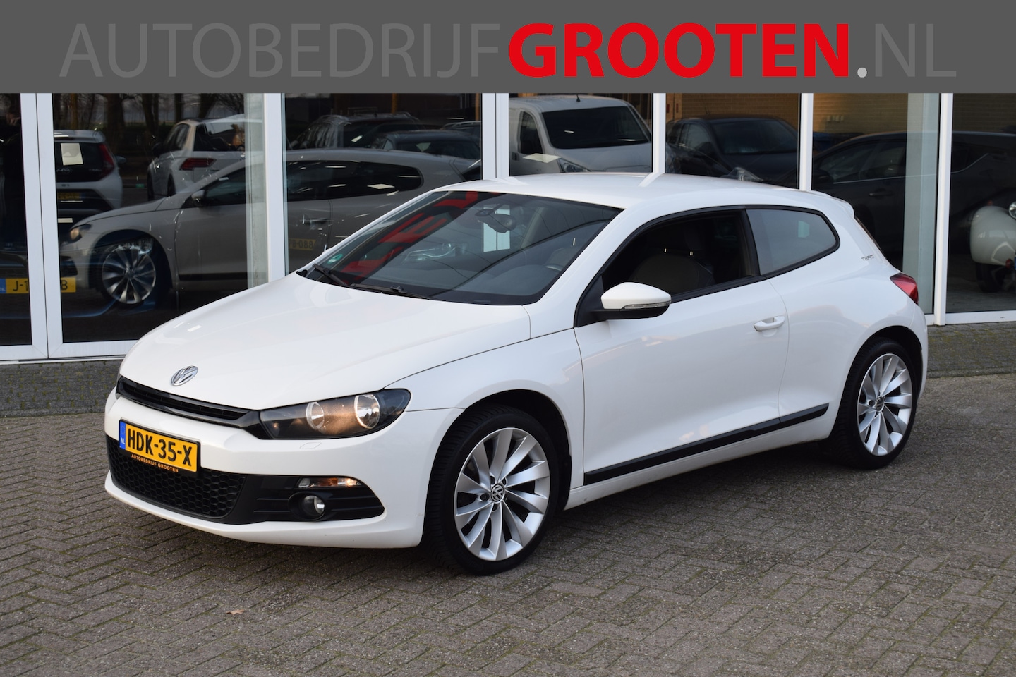 Volkswagen Scirocco - 1.4 TSI Highline//Navi//Stoelverwarming//Airco!! - AutoWereld.nl