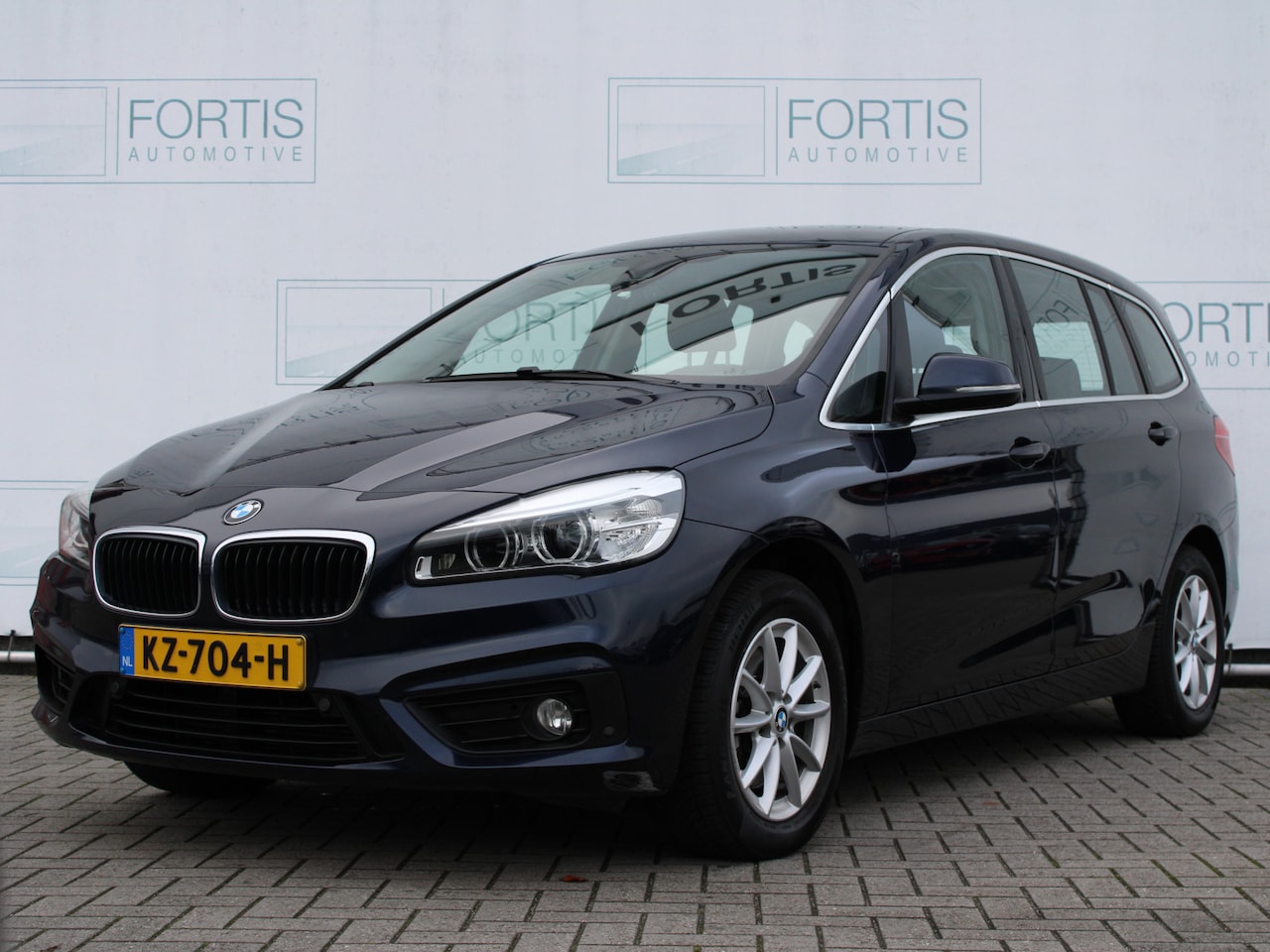 BMW 2-serie Gran Tourer - 218i Centennial High Executive NL AUTO | LEDER | PD VOOR ACHTER | STOELVERW | HEAD UP! - AutoWereld.nl