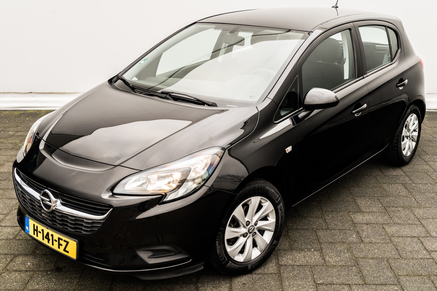 Opel Corsa - 1.2 70 Pk Enjoy | 5-drs. | Airco | Org. Audio | 15 inch LMV - AutoWereld.nl