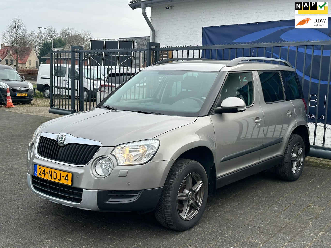 Skoda Yeti - 1.4 TSI Ambition / STOELVERWARMING / SENSOREN / AIRCO / NAVIGATIE - AutoWereld.nl