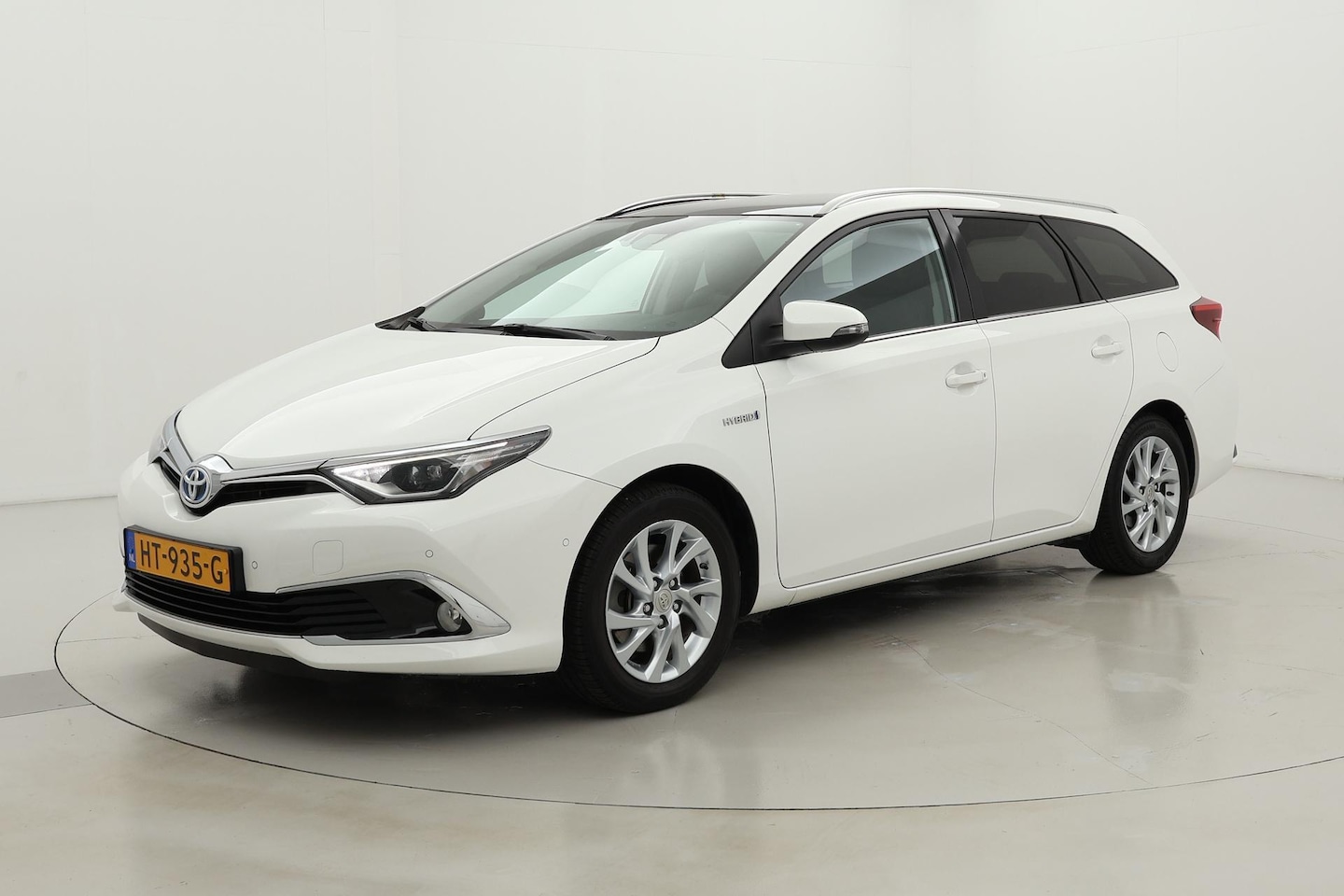 Toyota Auris Touring Sports - 1.8 Hybrid Lease pro | Panoramadak - AutoWereld.nl