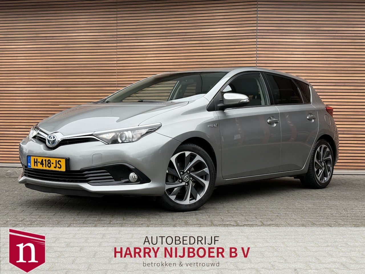 Toyota Auris - 1.8 Hybrid Executive Navi / Trekhaak / Clima / Cruise / Camera - AutoWereld.nl