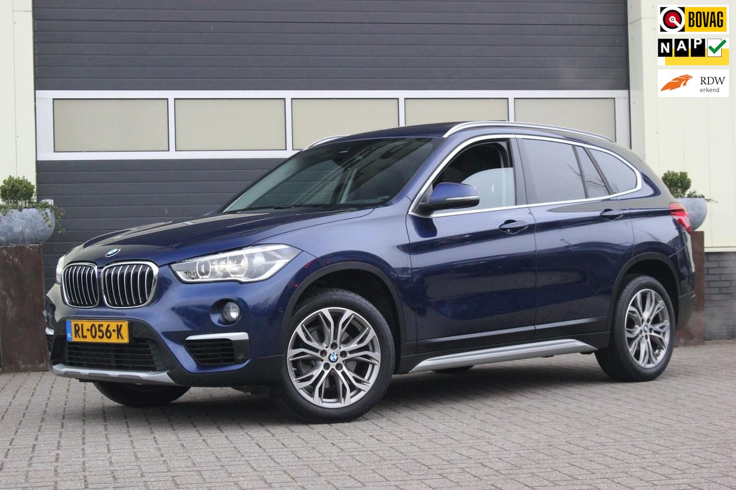 BMW X1 - SDrive18i High Executive xLine | Panoramadak | Head-up | - AutoWereld.nl