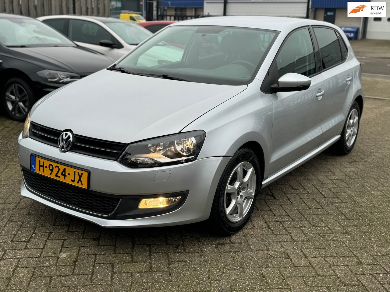 Volkswagen Polo - 1.2 TSI Highline / PDC / Stoelverw. - AutoWereld.nl