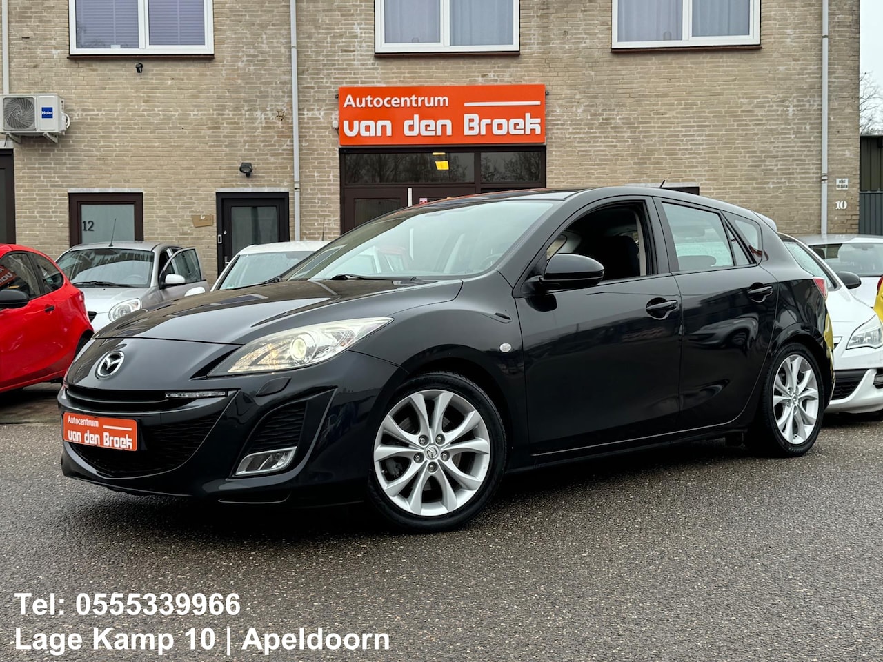 Mazda 3 - 2.0 DiSi GT-L Xenon Navi Keyless Go Climate Cruise Ctr Stoelverw Pdc - AutoWereld.nl