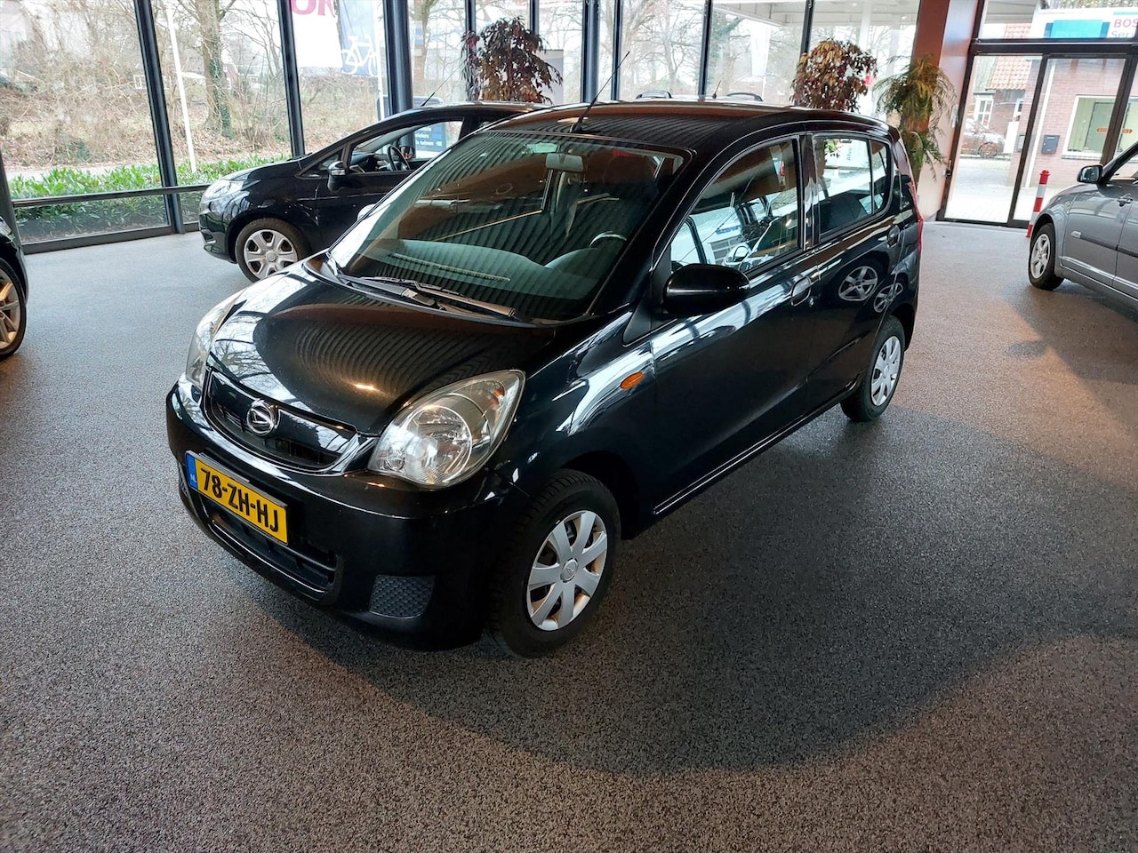 Daihatsu Cuore - 1.0 5D - AutoWereld.nl