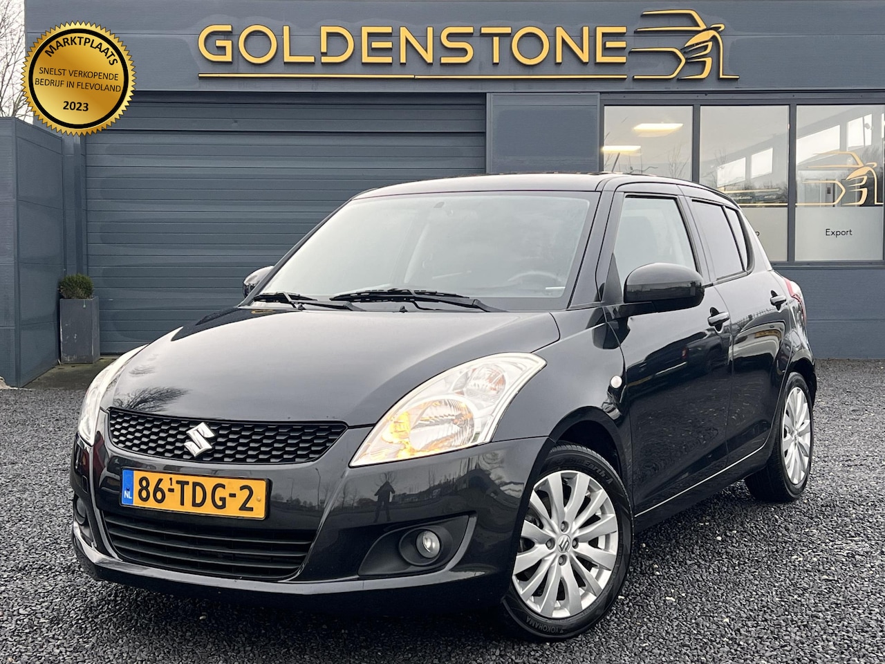 Suzuki Swift - 1.2 Exclusive 2e Eigenaar,Dealer Onderhouden,Clima,Cruise,Trekhaak,Stoelverwarming,Keyless - AutoWereld.nl