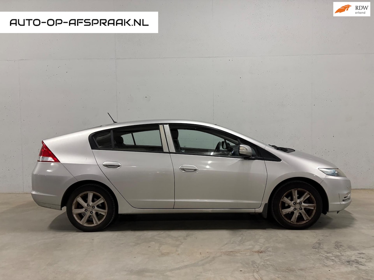 Honda Insight - 1.3 Automaat Airco Cruise Control - AutoWereld.nl