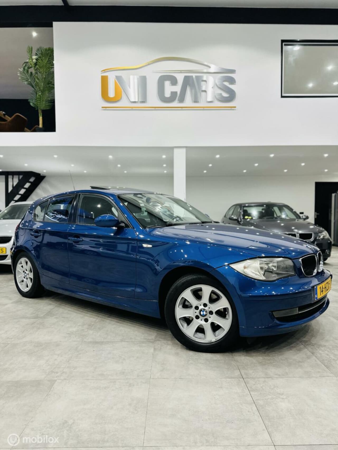 BMW 1-serie - 120i Executive Automaat|Navi|Clima|Opendak|LM - AutoWereld.nl