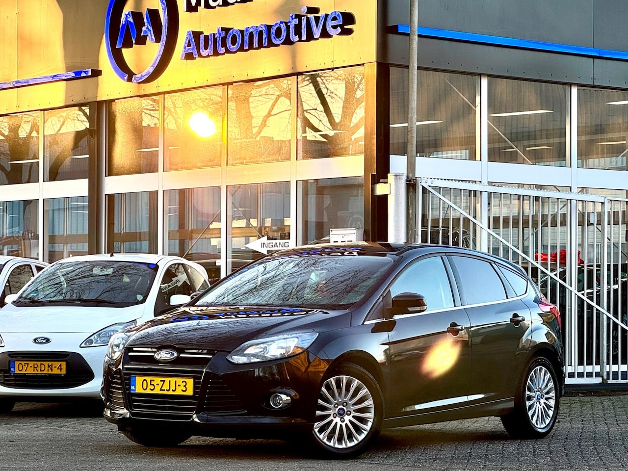 Ford Focus - 1.6 Navi Cruise Stoel vw PDC Groot onderhoudsbeurt EcoBoost 4x el.ramen Halfleder Airco To - AutoWereld.nl