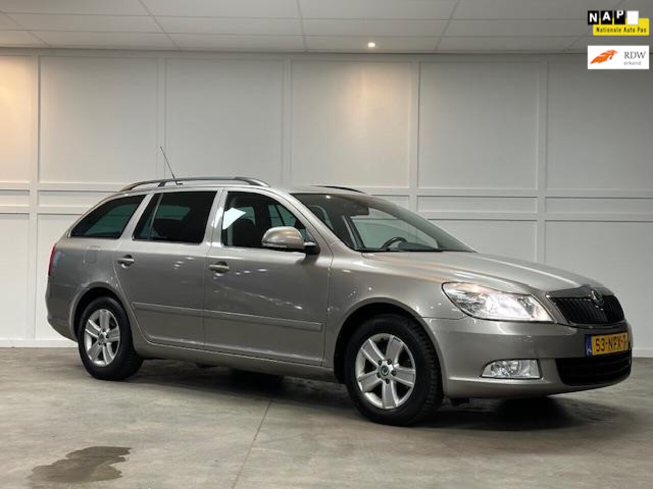 Skoda Octavia Combi - 1.2 TSI Ambition Business Line / 2010 / Navi / PDC - AutoWereld.nl