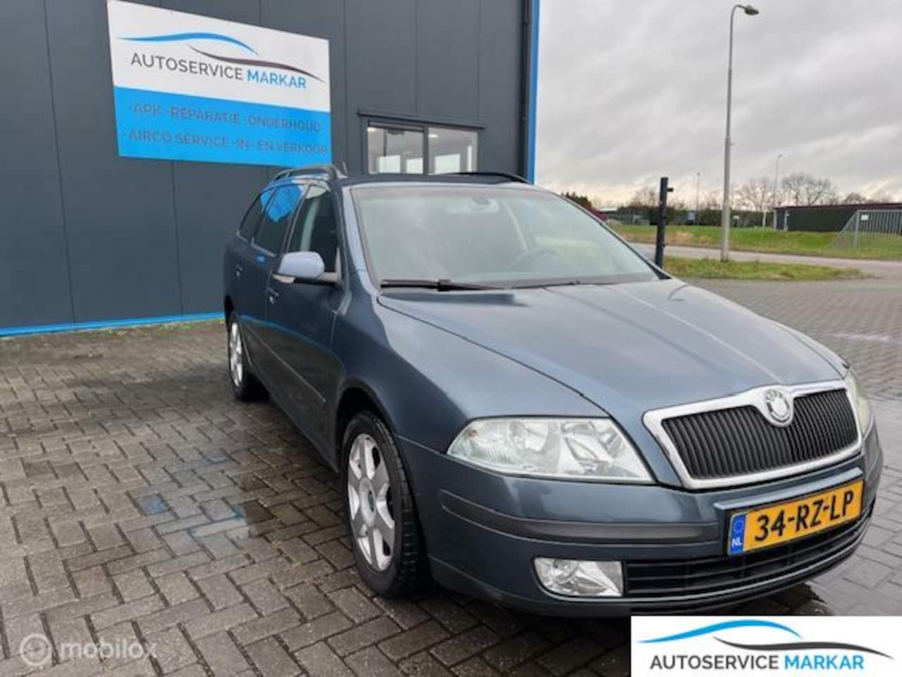 Skoda Octavia Combi - 1.6 FSI Elegance nette auto . - AutoWereld.nl