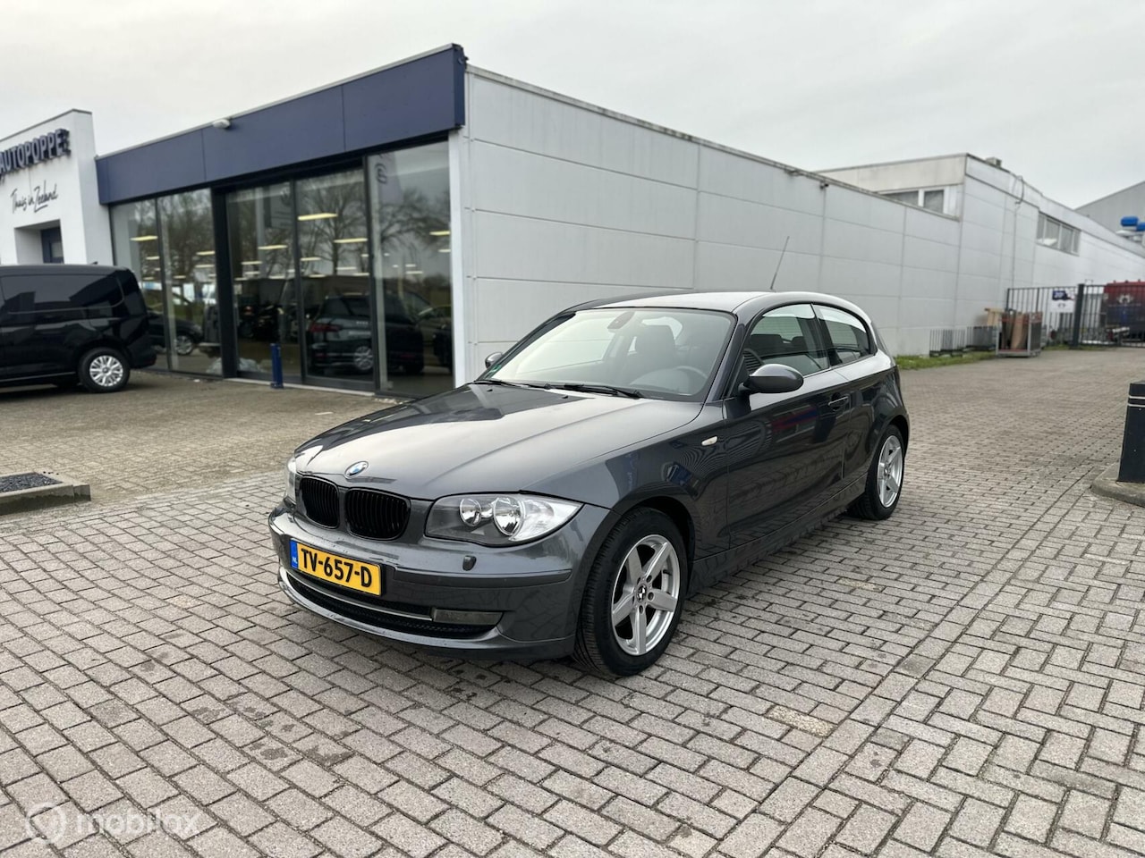 BMW 1-serie - 118i High Executive Clima PDC Cruise nap 143PK - AutoWereld.nl