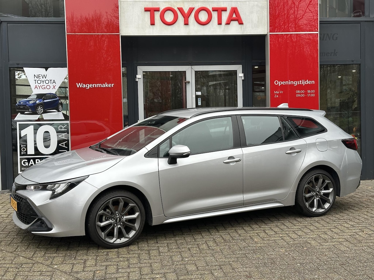 Toyota Corolla Touring Sports - Hybrid 140 NL-AUTO APPLE / ANDROID AD-CRUISE LED DAB+ CAMERA LICHTMETAAL - AutoWereld.nl