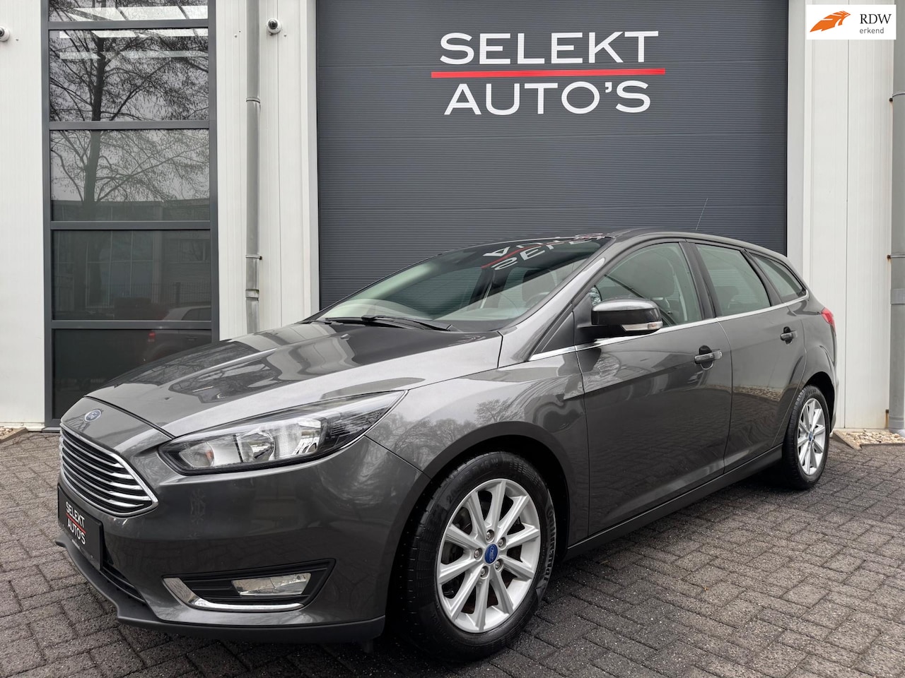 Ford Focus Wagon - 1.0 Titanium Edition Climate/Cruise/Navigatie/Bluetooth/Start & Stop/USB/Elekt Ramen/Elekt - AutoWereld.nl