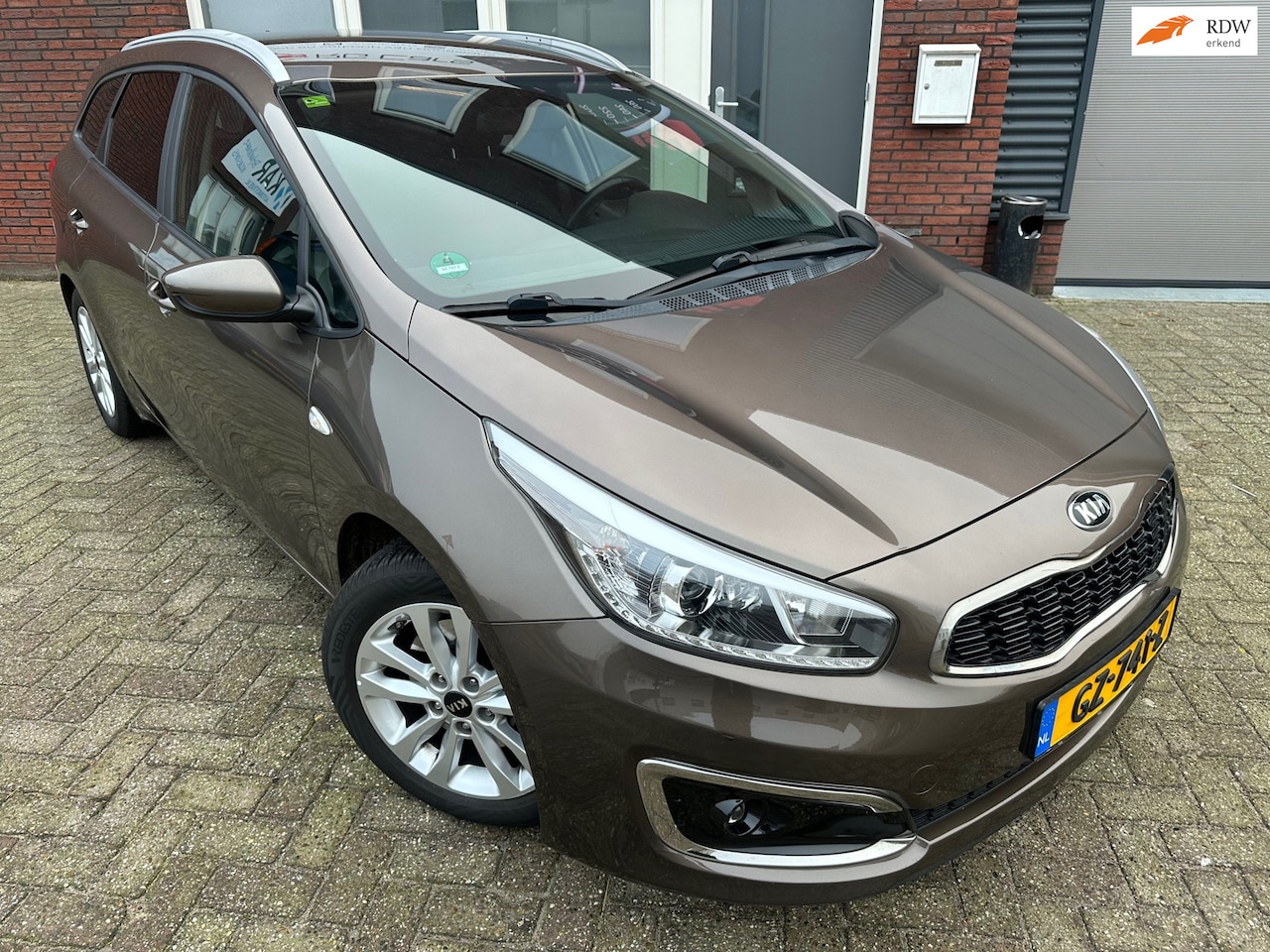 Kia Cee'd Sportswagon - 1.6 GDI First Edition / Navi / Camera / PDC / Cruise - AutoWereld.nl