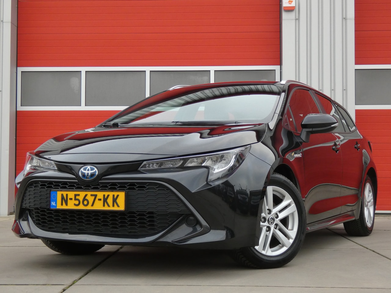 Toyota Corolla Touring Sports - 1.8 Hybrid Active/ lage km/ zeer mooi! - AutoWereld.nl