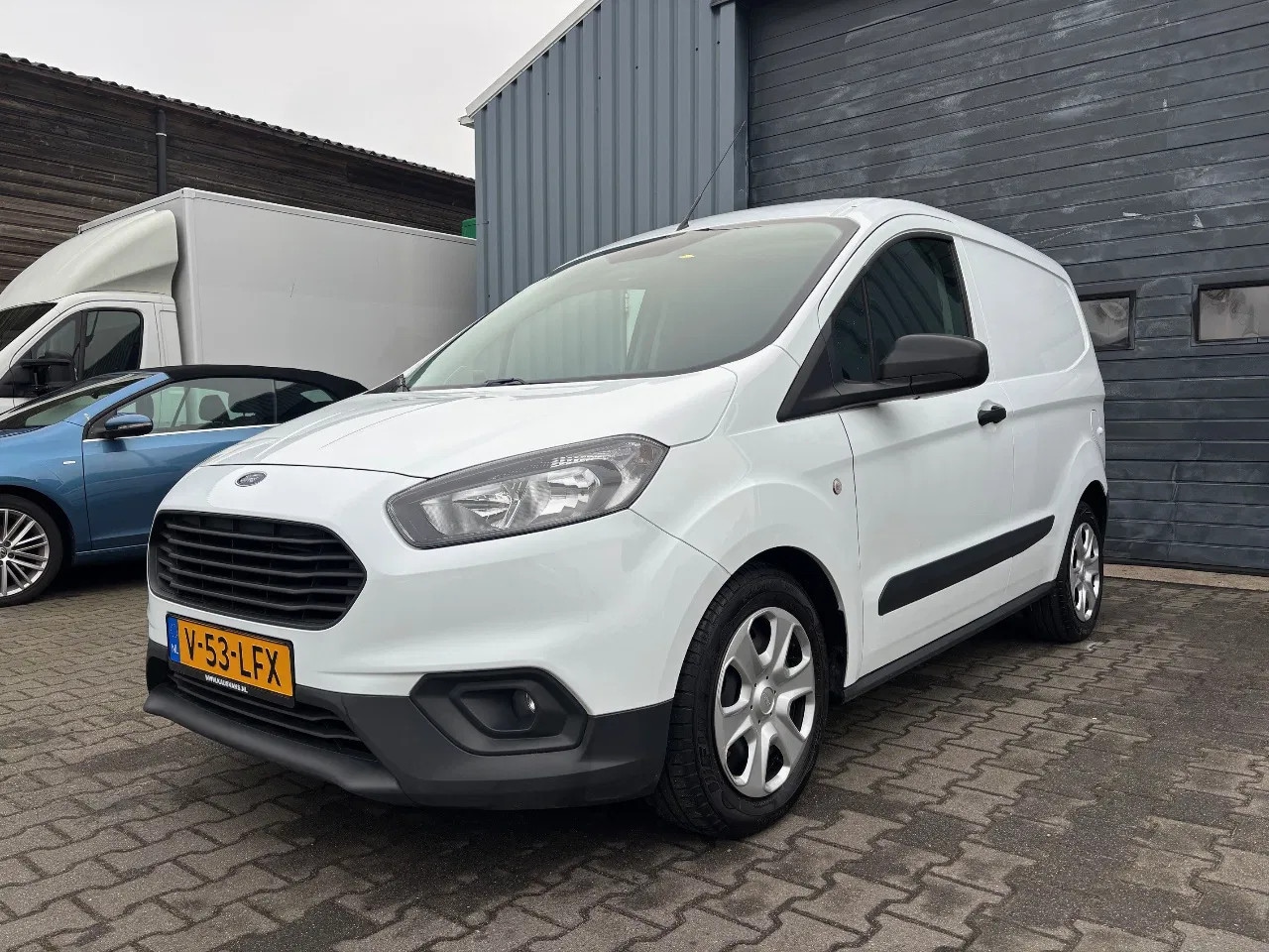 Ford Transit Courier - 1.5 TDCI L1 H1 Airco Navigatie - AutoWereld.nl