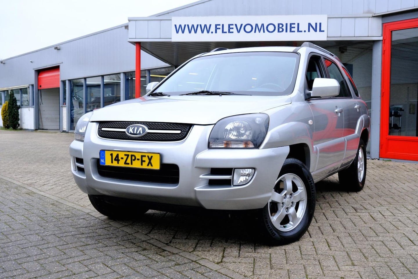 Kia Sportage - 2.0 CVVT 141pk X-ecutive Clima|LMV|Cruise|Navi via Android - AutoWereld.nl