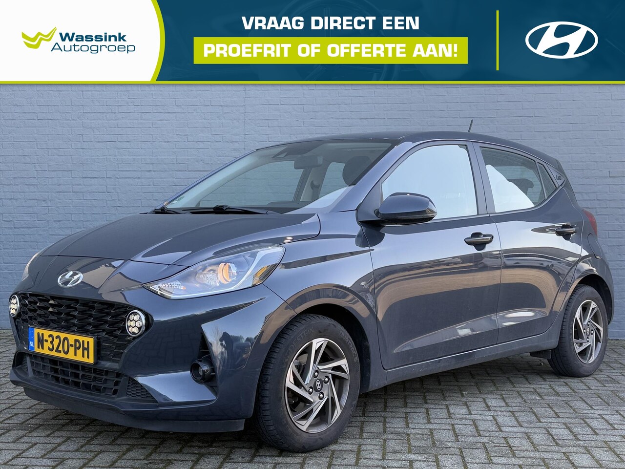 Hyundai i10 - 1.0i 67pk Premium | Climate Control | All Season Banden | 14 Inch LMV - AutoWereld.nl