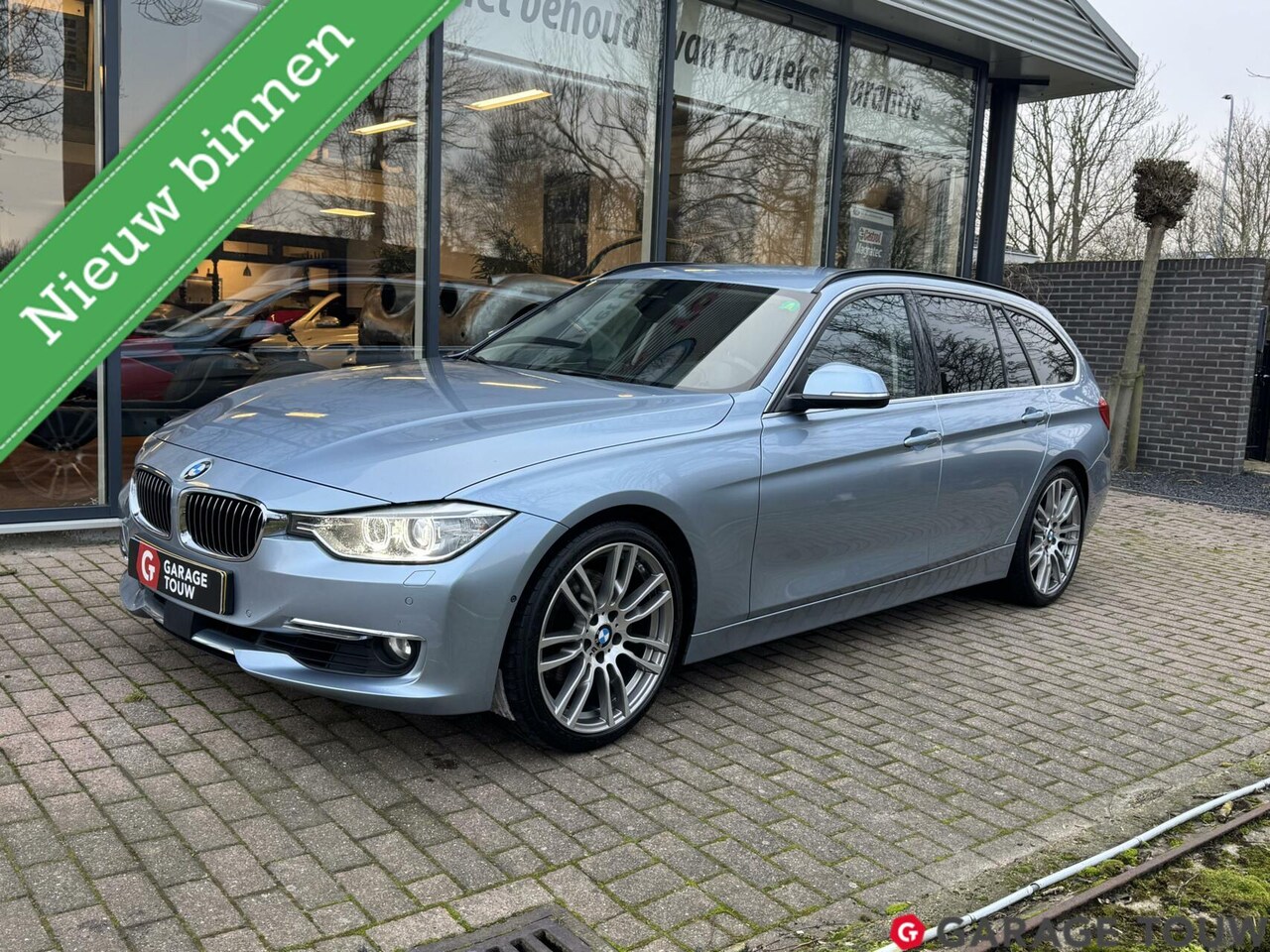 BMW 3-serie Touring - 328i High Executive Upgrade 328i High Executive Upgrade - AutoWereld.nl