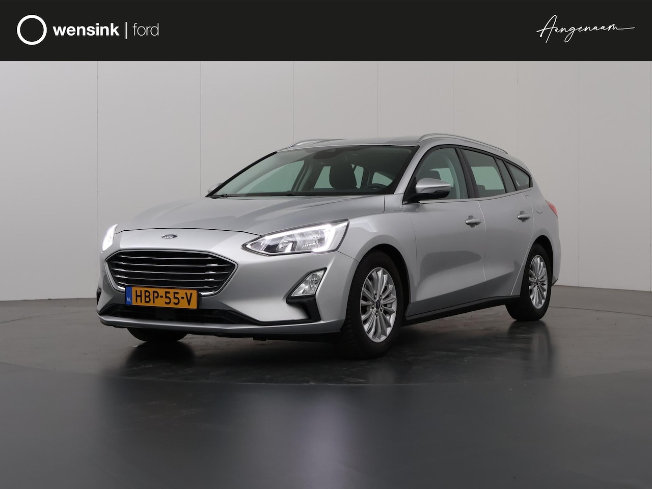 Ford Focus Wagon - 1.0 EcoBoost Titanium Business | Navigatiesysteem | Winterpack | Climate Control | Parkeer - AutoWereld.nl