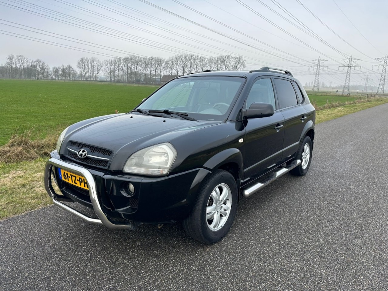 Hyundai Tucson - 2.0i Active CLIMA | LEDER | TREKHAAK ! - AutoWereld.nl