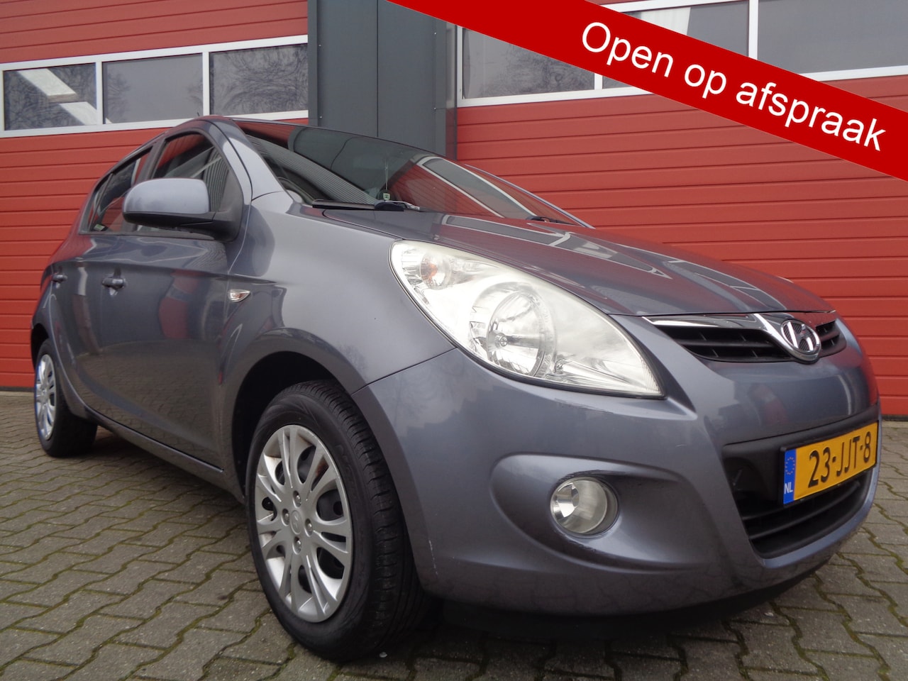 Hyundai i20 - 1.2i DynamicVersion 78PK Airco 5DRS NL-Auto - AutoWereld.nl