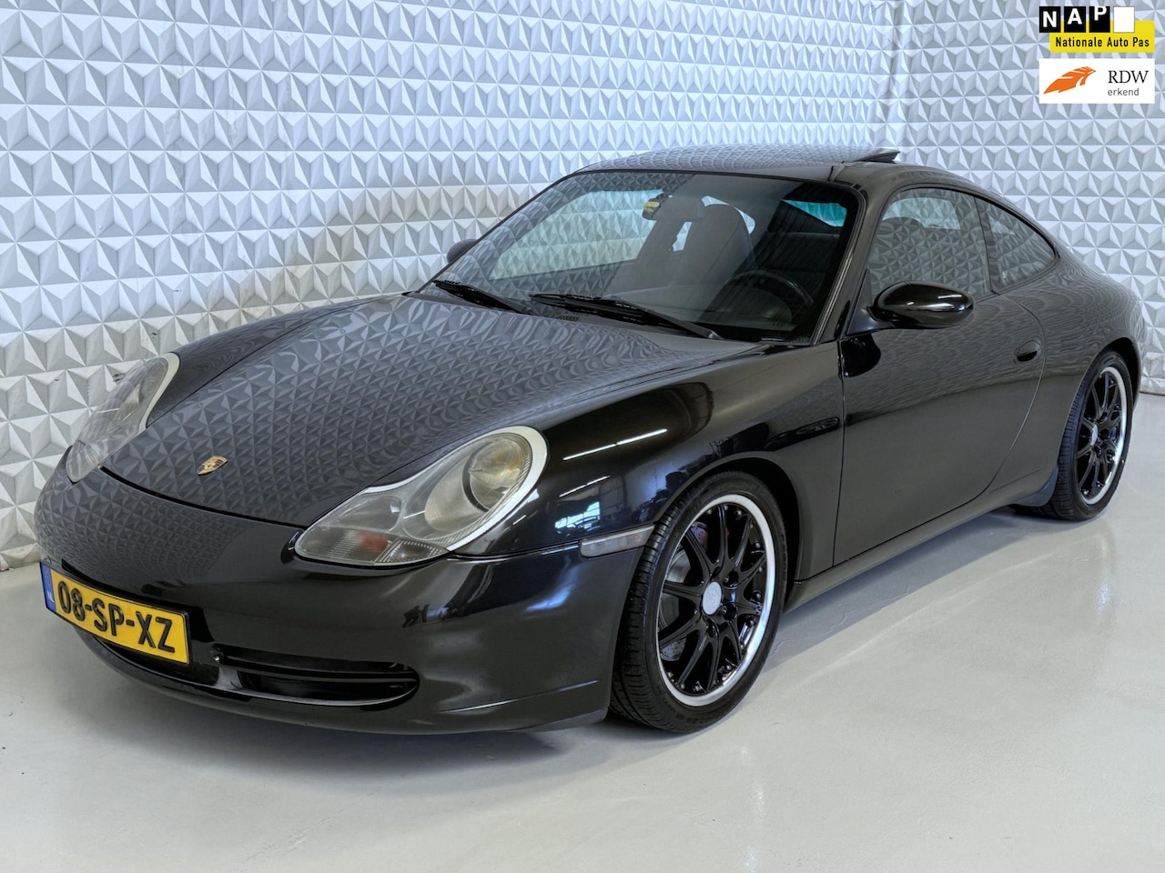 Porsche 911 - 3.4 Coupé Carrera mét historie! (1999) - AutoWereld.nl