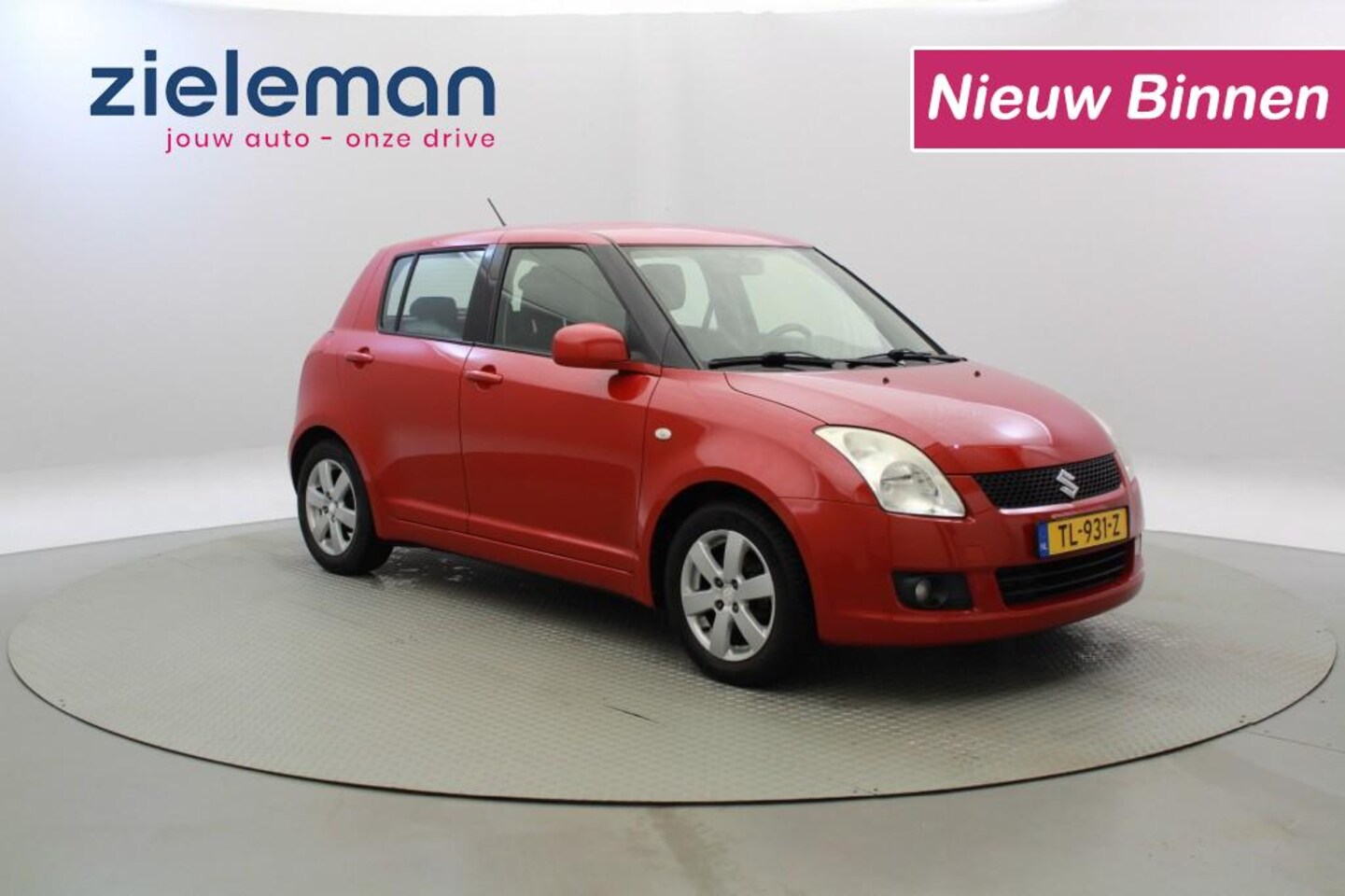 Suzuki Swift - 1.3 Base - 5 deurs, airco, lichtmetalen velgen - AutoWereld.nl